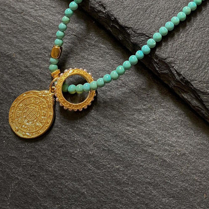 Healing through Stillness Turquoise Gold Necklace